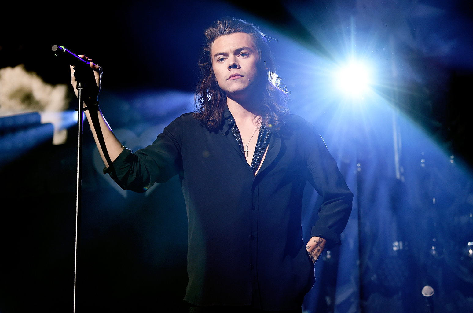 DALLAS, TX - DECEMBER 01:  Singer Harry Styles of musical group One Direction performs onstage during 106.1 KISS FM's Jingle Ball 2015 presented by Capital One at American Airlines Center on December 1, 2015 in Dallas, Texas.  (Photo by Kevin Mazur/Getty Images for iHeartMedia)