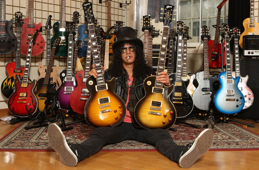 Slash attends the launch of his Limited Edition Gibson and Epiphone SLASH Les Paul guitars at the Gibson Guitar Studios in central London.